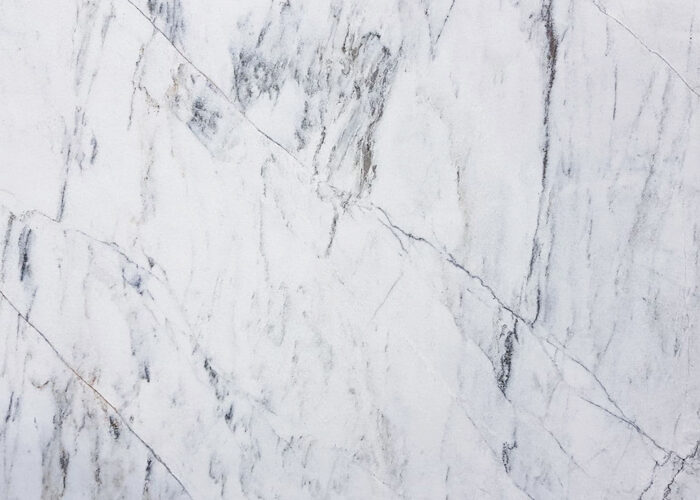 A cheap white marble with dark gray veining on a white colored background, very similar to Italian Statuario or Arabescato marble. But compared to Statuario or Arabescato, it has a darker gray vein and a more irregular pattern. Therefore, quite some vein variation should be expected. Supplied by Atlas Tile & Stone.