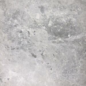 A very popular and affordable grey marble. Tundra grey is a classic, light grey- white marble with a cloudy pattern which brings to mind vast frozen arctic grounds with its clouded greys and pewters. Supplied by Atlas Tile and Stone in 610x610x10mm and 610x305x10mm with honed finish. In stock