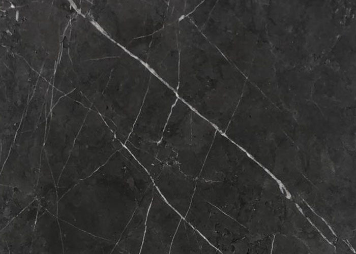 A very popular and affordable black marble. Pietra Grey has a muddy charcoal grey background with some white veins on the surface. Supplied by Atlas Tile and Stone in 600x300x13mm and 600x300x15mm with honed and polished finishes. In stock