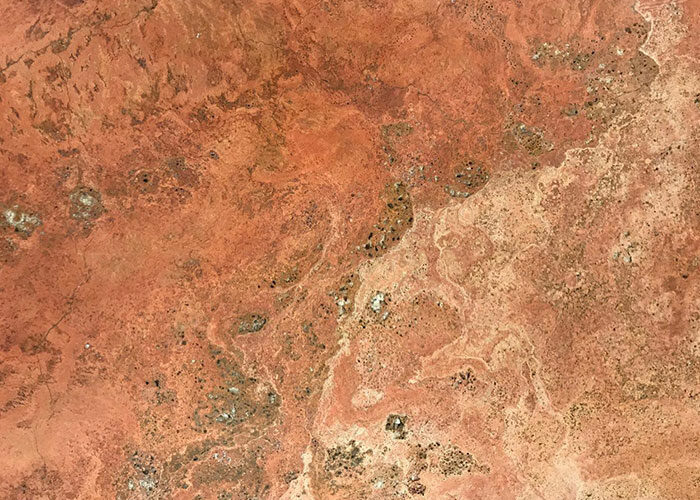 A special travertine natural stone tile with a brilliant mix of reds, oranges and rusts bring sense of exclusivity to your projects. Atlas Tile and Stone. SHOP NOW!