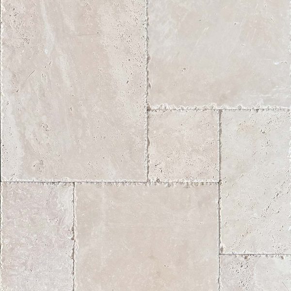 The French-pattern format of a Turkish beige travertine with chiseled edge. Can be used as tile and paver for indoor and outdoor. Melbourne beige travertine supplier; Atlas Tile and Stone.