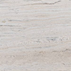 A lovely natural silver travertine vein cut tile with a creamy background and silver and orange vein. Silver travertine importer; Atlas Tile and Stone.